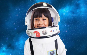 Girl wearing a spacesuit with a background of outer space